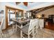 Dining room with a four-person table and access to the sun room and the living room at 506 N County Road 900 E, Avon, IN 46123