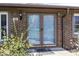 Inviting front entrance with elegant double doors and brick facade at 506 N County Road 900 E, Avon, IN 46123