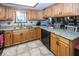 Kitchen featuring a tile backsplash, stainless steel dishwasher, and granite countertops at 506 N County Road 900 E, Avon, IN 46123