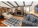 Cozy living room with brick fireplace and wainscotting at 506 N County Road 900 E, Avon, IN 46123