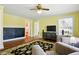 Inviting living room with hardwood floors, natural light, seating and a built-in chalkboard at 516 S 10Th St, Noblesville, IN 46060