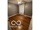 A cozy bedroom featuring hardwood floors, ceiling fan, and natural light at 517 Dicks St, Lebanon, IN 46052