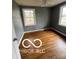 Bedroom with hardwood floors, and natural light at 517 Dicks St, Lebanon, IN 46052