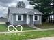 Charming single-story home with gray siding, well-maintained lawn, and inviting front entrance at 517 Dicks St, Lebanon, IN 46052
