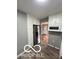 Charming kitchen with stainless steel appliances and neutral gray walls at 517 Dicks St, Lebanon, IN 46052