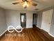 Spacious living room with beautiful hardwood floors at 517 Dicks St, Lebanon, IN 46052