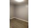 Spacious bedroom with light-colored flooring, white trim, and neutral wall color, providing a bright and airy feel at 548 S Vine St, Indianapolis, IN 46241
