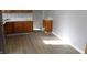 Well-lit kitchen featuring traditional cabinets and wood-look flooring at 548 S Vine St, Indianapolis, IN 46241