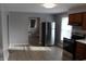 Modern kitchen featuring stainless steel appliances and wood-look flooring at 548 S Vine St, Indianapolis, IN 46241