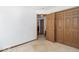This simple bedroom features a neutral color palette, and closet space at 5634 Wynridge Ct, Indianapolis, IN 46235