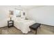 Cozy bedroom featuring neutral decor, carpet flooring, and a window providing natural light at 5634 Wynridge Ct, Indianapolis, IN 46235