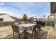 Outdoor deck space perfect for entertaining, featuring a dining table and seating at 5634 Wynridge Ct, Indianapolis, IN 46235
