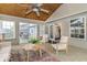 Spacious sunroom with a vaulted ceiling, offering versatile living space with natural lighting and outdoor access at 5634 Wynridge Ct, Indianapolis, IN 46235