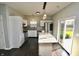 Modern kitchen with white cabinets, granite countertops, and stainless appliances at 5828 Long Lake Ln, Indianapolis, IN 46235