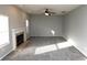 Cozy living room with a fireplace and plush carpeting at 5828 Long Lake Ln, Indianapolis, IN 46235