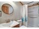 Bathroom featuring shower, sink, and decorative shower curtain at 611 Victor Pl, Shelbyville, IN 46176