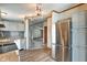Updated kitchen with stainless steel appliances that connects to the living room at 611 Victor Pl, Shelbyville, IN 46176