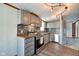 Bright, updated kitchen boasts stainless appliances and plenty of counter space at 611 Victor Pl, Shelbyville, IN 46176
