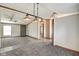 Open-concept living room with modern lighting and neutral decor at 611 Victor Pl, Shelbyville, IN 46176