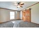 Spacious main bedroom featuring barn door entry to bathroom at 611 Victor Pl, Shelbyville, IN 46176