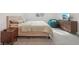 Bright bedroom featuring a cozy bed, modern dresser with a television, and comfortable green beanbag at 622 Conner Creek Dr, Fishers, IN 46038