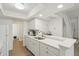 Clean kitchen with white cabinetry, modern sink, and stainless steel appliances at 622 Conner Creek Dr, Fishers, IN 46038