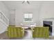 Cozy living room with a fireplace, modern furniture, and stylish decor at 622 Conner Creek Dr, Fishers, IN 46038