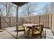 Inviting patio with round table and chairs, creating a comfortable outdoor dining area at 622 Conner Creek Dr, Fishers, IN 46038