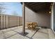 Cozy outdoor patio with a round table and four chairs, perfect for entertaining at 622 Conner Creek Dr, Fishers, IN 46038