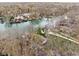 Expansive aerial view of lake community with lakefront houses and docks on a gray spring day at 6948 Eagle Dr, Nineveh, IN 46164