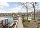 Scenic view of lakefront property with a private dock and boat slips; great for outdoor living at 6948 Eagle Dr, Nineveh, IN 46164