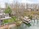 Panoramic aerial shot showcases lakefront properties with private docks and serene water views at 6948 Eagle Dr, Nineveh, IN 46164