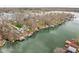 Aerial view of a lakefront home with a private dock and boat lift at 6948 Eagle Dr, Nineveh, IN 46164