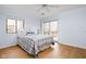 Bright bedroom featuring hardwood floors, large windows and a sliding glass door leading to the outside at 6948 Eagle Dr, Nineveh, IN 46164