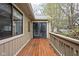 Charming wooden deck with a view of the surrounding trees, perfect for enjoying the outdoors at 6948 Eagle Dr, Nineveh, IN 46164