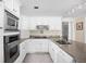 Well-lit kitchen boasts stainless steel appliances, granite countertops, and ample cabinet space at 6948 Eagle Dr, Nineveh, IN 46164