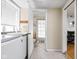 Well-lit laundry room area with washer, dryer, and tile flooring at 6948 Eagle Dr, Nineveh, IN 46164