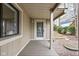 Inviting porch with a cozy atmosphere and a glimpse of the surrounding greenery at 6948 Eagle Dr, Nineveh, IN 46164