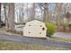 A cute shed with a basketball rim and an asphalt driveway at 6948 Eagle Dr, Nineveh, IN 46164