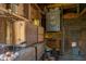 Interior view of the chicken coop with wooden storage boxes and wire mesh at 7124 Purdy St, Indianapolis, IN 46268