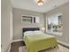 Inviting bedroom with natural light, plush rug, and comfortable bed setup at 741 Bates St, Indianapolis, IN 46202