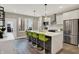 Modern kitchen featuring a large island, stainless steel appliances, and sleek finishes at 741 Bates St, Indianapolis, IN 46202