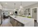 Spacious kitchen with island, modern finishes and open to the living area at 741 Bates St, Indianapolis, IN 46202