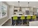 Stylish kitchen with a breakfast bar, modern lighting, and stainless steel appliances at 741 Bates St, Indianapolis, IN 46202