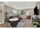 Living room showcasing an open floorplan, neutral colors, and wood-look flooring at 741 Bates St, Indianapolis, IN 46202