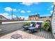 Relaxing rooftop deck featuring outdoor seating, planters, and views of the city skyline at 741 Bates St, Indianapolis, IN 46202