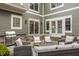 Backyard patio with an outdoor grill and wicker seating, perfect for entertaining and relaxing at 7613 W Stonegate Dr, Zionsville, IN 46077