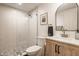 Modern bathroom featuring a walk-in shower, stylish vanity, and sleek fixtures at 7613 W Stonegate Dr, Zionsville, IN 46077