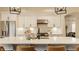 Kitchen featuring a center island, sleek countertops, stainless steel appliances, and modern pendant lights at 7613 W Stonegate Dr, Zionsville, IN 46077