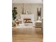 Cozy living room with a fireplace, neutral tones, and stylish décor at 7613 W Stonegate Dr, Zionsville, IN 46077